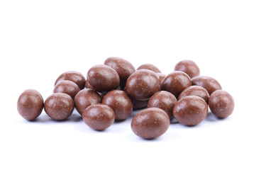 Dark brown dragee, in chocolate covered.