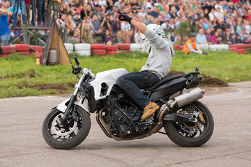 Biker stunt shows on motorcycle