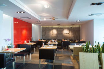 Interior of the cozy cafe with red wall