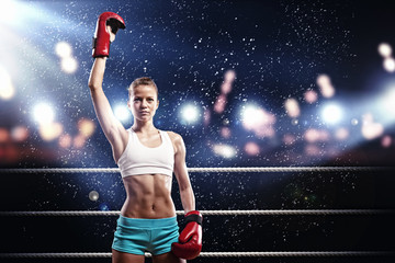 Fototapeta na wymiar Young boxer woman