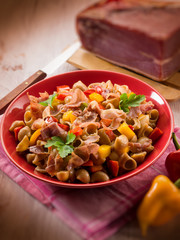 pasta with capsicum and parma ham, selective focus