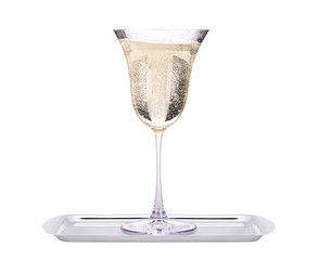 glass of champagne on a tray isolated