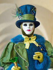 Fototapeta na wymiar Venetian costume attends Carnival of Venice.