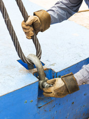 Fit anchor shackle bolt  to crane counterweight - obrazy, fototapety, plakaty