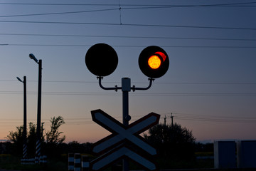 Red signal at a railway crossing