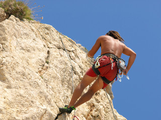 Young man climbing