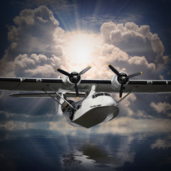 Vintage seaplane flying against sunset over sea.