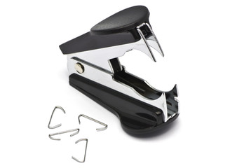 Black staple remover along with some used staples