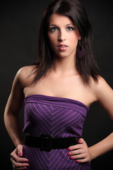 Fototapeta premium Beautiful brunette in the studio