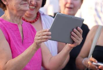 Older women with tablet computer