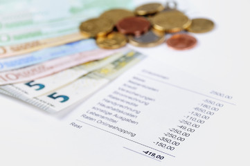 Euro bill and Coins with chart