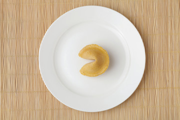 Fortune cookies on white plate