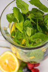 Pitcher of water infused with fruit and mint