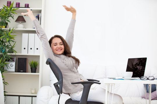 woman stretching at workplace