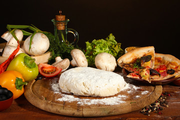 delicious pizza dough, spices and vegetables