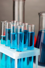 Test-tubes on color background