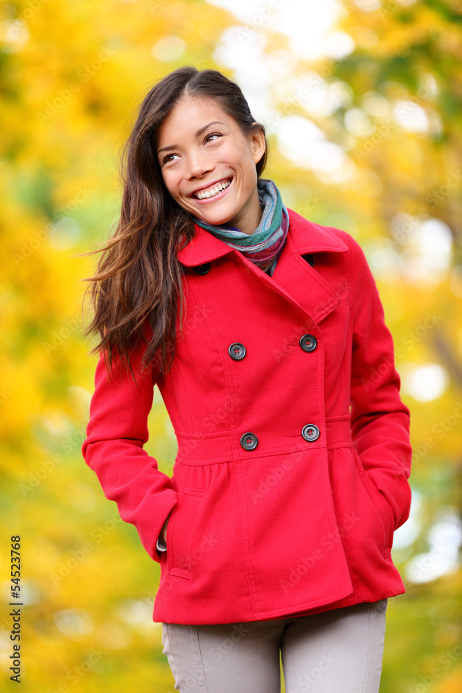 Wall mural autumn people - fall woman walking in forest