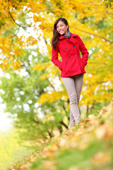 Beautiful young woman fall autumn nature scene