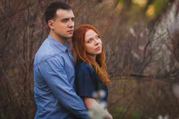 couple hugging in the garden