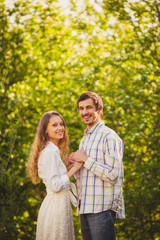 Fototapeta premium happy couple walking at park