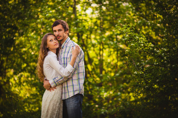 Fototapeta premium couple in love standing at summer park