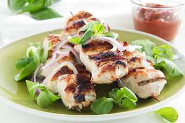 Chicken shish kebab on skewers.