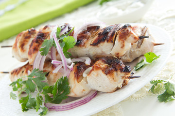 Chicken shish kebab on skewers.
