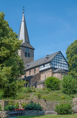 Fototapeta na wymiar die historische romanische Kirche von Mehren im Westerwald