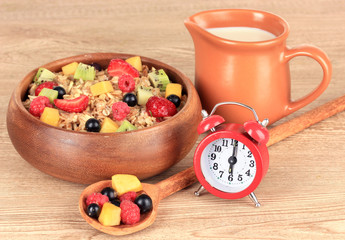 Oatmeal with fruits on table close-up