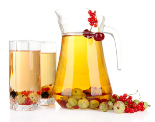 Pitcher and glasses of compote with summer berries isolated