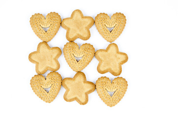 Star and heart shaped biscuits - Abstract background