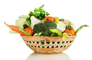 Fresh vegetables in basket isolated on white
