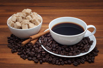 Coffee cup and saucer on a wooden table