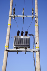 Wooden Utility Pole with Power Lines and transformer on sky