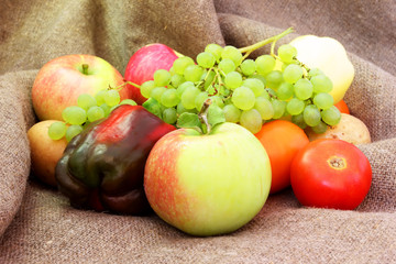 heap of fruits and vegetables on a sackcloth