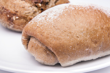 Large loaf of breads on white background