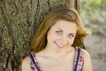 girl with blue eyes and a charming smile