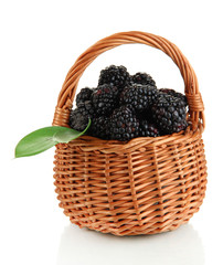 Fototapeta na wymiar Ripe blackberries in basket isolated on white