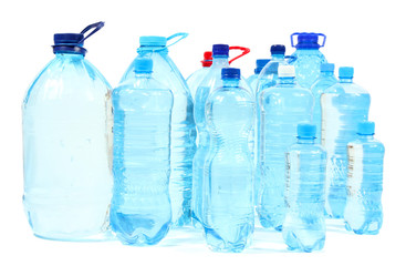 Naklejka premium Water in big bottles isolated on white