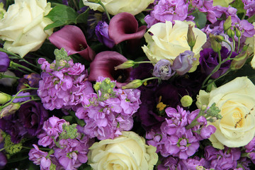 Purple and white bridal arrangement