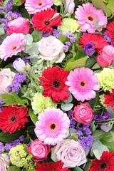 Wedding arrangement in red, purple and pink