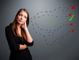 Young woman choosing between right and wrong signs