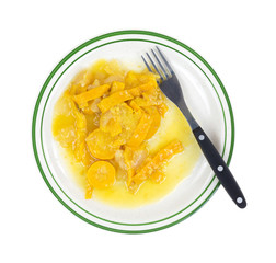 Cooked onions and squash on plate with fork