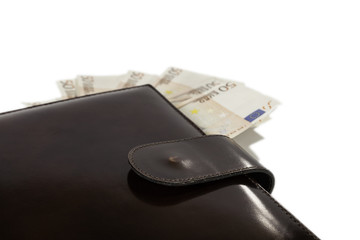 cartera de cuero con billetes