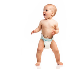 One-year old boy looking at something with surprise and joy