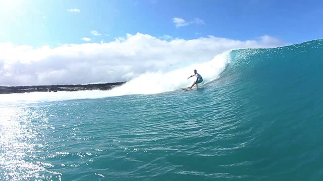 Surfer Doing Turn On Blue Wave
