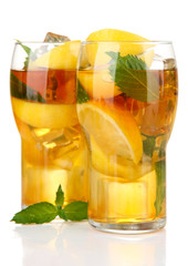 Iced tea with lemon and mint isolated on white