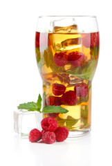 Iced tea with raspberries and mint isolated on white