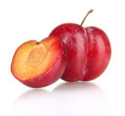 Ripe plums isolated on white