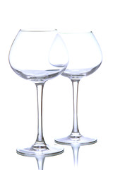 Empty wine glasses isolated on white